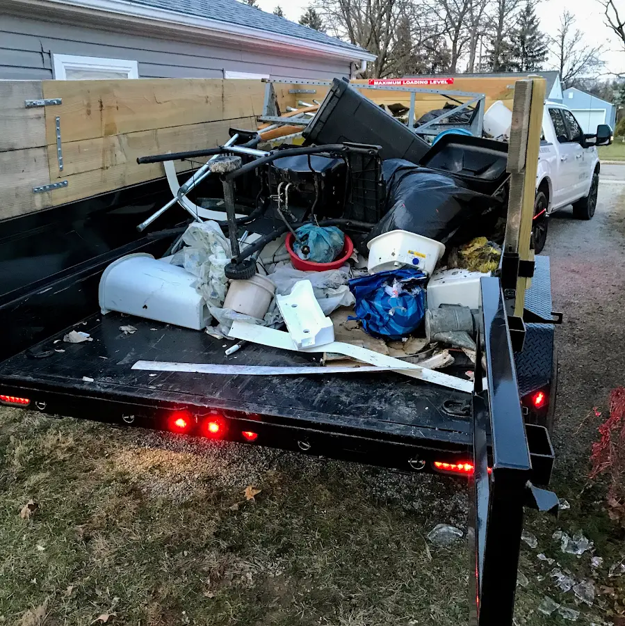 Roll-off dumpster delivered to a residential driveway in Butler
